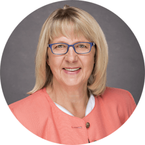 Headshot of Hildegard Bembry who has worked for Steve's Floral for over twenty years as a floral designer. She is the only AIFD certified florist in the Manhattan, KS area.